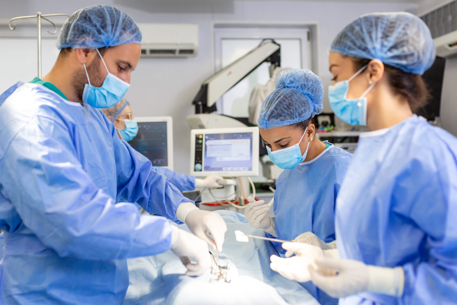 Medical staff in the middle of a surgery - Post Operative infections - The Pagan Law Firm