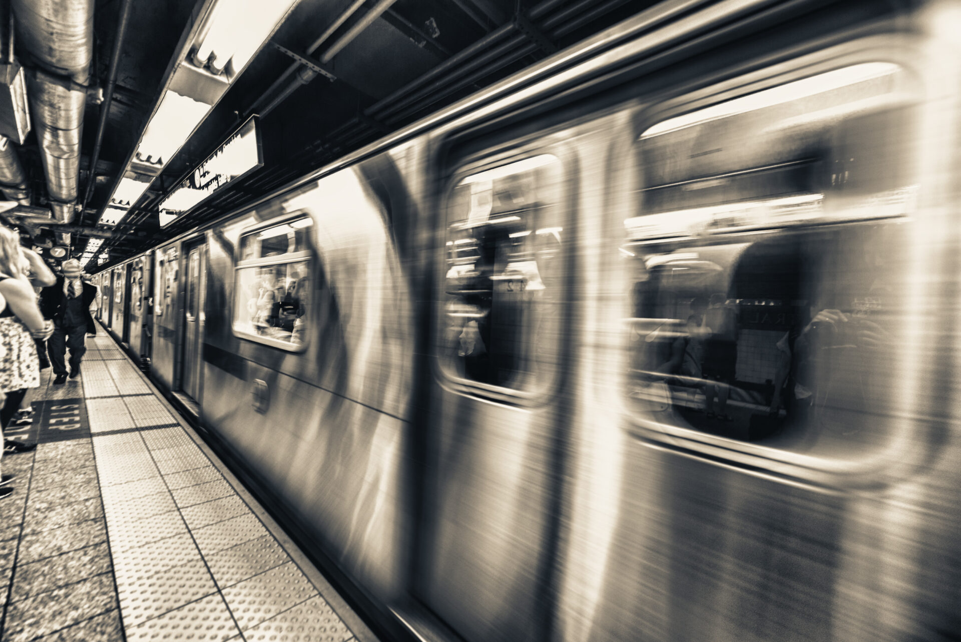 A dynamic scene capturing a subway train rapidly accelerating, showcasing the energy and movement of urban transportation.
